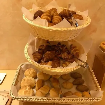 Отель Merope Римини